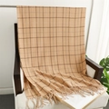 Detail of khaki plaid scarf with fringe texture draped on a wooden chair - 200x65cm / Khaki