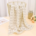 Détail de la couverture bébé en mousseline de coton douce avec imprimé floral marron - 80*65 cm / Feuilles Kaki Foncé