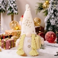 Luminous Christmas gnome doll with white plush beard and golden snowflake sequins - Light-up Gnome with Yellow Braids