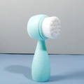Dual-sided cat paw manual facial cleansing brush in light blue with soft bristles - Small Standing Bump Facial Brush / Green