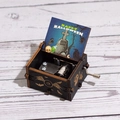 Handcranked Halloween wooden music box with bat carvings and spooky scene illustration - Hand-cranked Halloween D