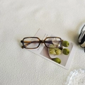 Retro rectangular sunglasses with brown tortoiseshell frames for a vintage street style look - Striped Frame White Lens