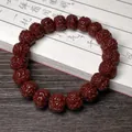 Traditional deep red Rudraksha seed bracelet featuring dense natural textured beads - Machine-brushed Jadeized 8-12mm (Single Loop)