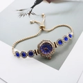 Elegant gold quartz watch with blue stones and adjustable drawstring bracelet - Rose Gold Blue