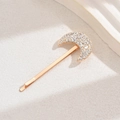 Eleganter goldener Mond-Haarclip mit glitzernden Strasssteinen auf beigem Grund - Mond D5338 / Gold