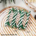 Green and white spiral Christmas cane ornaments with gold hanging string in a set of six - Green