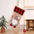 Linen Christmas stocking with red plaid cuff and gnome applique for holiday decoration - Striped Hat Style