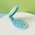 Light blue portable folding hairbrush with built-in mirror and compact travel design - Lake Blue