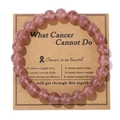 Close-up of pink natural stone bead bracelet on a motivational brown kraft card - Strawberry Quartz