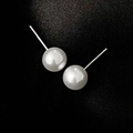 Minimalist round white pearl stud earrings with S925 silver pins on black textured fabric - S925 Silver Needle-10mm