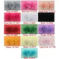 Detail view of 13 colorful chiffon flower nylon headbands for babies on a white background - 14 Colors Mixed