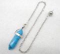 Detail of turquoise hexagonal crystal pendant with silver chain and hollow metal ball charm - Turquoise