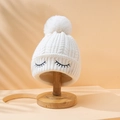 Grazioso berretto in maglia bianca per neonati con pompon e occhi ricamati - Taglia unica / Bianco