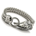 Macro detail of men's stainless steel Franco chain bracelet with a vintage wolf head clasp - 21cm / Silver Bird Beak