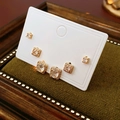 Set of six rose gold square stud earrings with clear crystals on a white display card - Square Set / Rose Gold