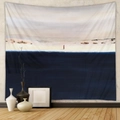 Artistic minimalist tapestry showing a deep blue sea and small red silhouette on wall - CX0327-16
