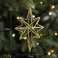 Sparkling gold 15cm Christmas star ornament with glitter finish on a festive tree branch - Large Gold Eight-Pointed Star