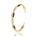 Detail van vergulde armband met zwart-wit emaille inleg en micro-gezette zirkonia steentjes - Zwart en Wit Emaille (S84-8)