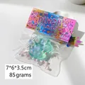 Translucent teal cat paw squeeze toy with glitter and white beads, size 7x6x3.5cm - Crystal Polarized Blue Cat Claw