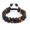 Detail of hand-woven bracelet with tiger eye stones and volcanic lava beads - 3A Yellow Tiger Eye + 3A Lava Rock + Matte Glass Beads