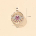 Silver evil eye pendant with pink and clear crystals, dimensions 2.5cm by 1.8cm - Silver Round Eye Inlaid Pink Gems Pendant (17-9)