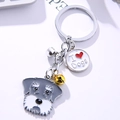Metal keychain featuring a gray schnauzer dog charm with a bell and I love dogs tag - Grey Schnauzer Head + I Love Dogs Tag