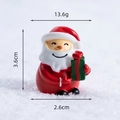 Miniature resin Santa Claus figurine holding a green gift box with 3.6cm height - Santa Holding Gift Box