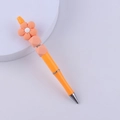Close-up of orange DIY beaded pen with flower silicone bead and rhinestone detail - Rose Pink