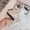 Close-up of floral cotton pouch with zipper and Simple Wish label for small items - Light Blue Small Floral
