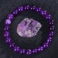 Natural amethyst beaded bracelet with purple raw crystal stone on black texture - Purple Jade