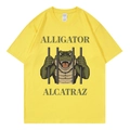 Bright yellow short sleeve cotton T-shirt featuring Alligator Alcatraz graphic print - Yellow