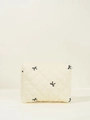 Borsa da trucco trapuntata beige con fiocchi ricamati neri e chiusura a zip - Borsa Interna Media / Beige