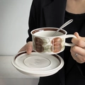 Vintage ceramic coffee cup and saucer set with brown and green fruit pattern and metal spoon - Brown Flower