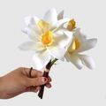 Handheld bouquet of 3D printed artificial white cymbidium orchids with orange centers - White