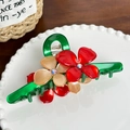 Green acetate flower claw clip with red and pink petals and sparkling rhinestones - Green