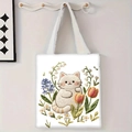 Détail des motifs brodés de chat et fleurs sur un grand sac fourre-tout en toile blanche - Chat Blanc et Muguet (jiayingstd97)