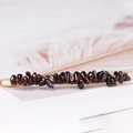 Gold hair clip featuring natural deep red crystal crushed stones in a minimalist style - Garnet + Gold Clip