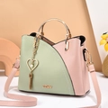 Green and pink color-block handbag with heart pendant and gold circular handle - Bean Green and Pink