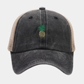 Macro shot of embroidered pineapple detail on washed cotton mesh baseball cap - Pineapple Pattern