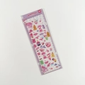 Detail of holographic pompomroom stickers featuring pink purple cartoon bears and cats - Dessert Cat