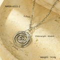 Macro shot of silver spiral rose pendant with technical specs on stone texture background - 18K Silver Plated / Silver (NMSN-A322-2)