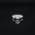 Elegant six-prong moissanite diamond ring in silver titanium steel on reflective black base - US 5 / Steel
