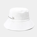 White cotton bucket hat featuring a sparkling rhinestone pin on a clean grey background - White