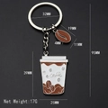 3D white coffee cup and bean metal keychain with Caffe text and precise dimensions - Coffee Cup & Bean Charms