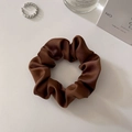 Brown satin silk scrunchie with elegant pleats shown in a luxury lifestyle setting - Small Brown (approx. 8CM)
