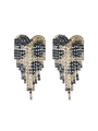 Macro shot of long heart-shaped tassel earrings featuring sparkling black and gold rhinestones - Gold Black Grey Leopard Gradient