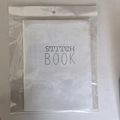 Portable white fabric embroidery stitch book in a protective clear plastic packaging - Stitch Practice Book - Style A