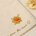 Golden sun pendant with orange stone on beige cotton bag with dried flower accents - Pendant Only (Without Chain)-Sun Shape Orange (SAC23061917)