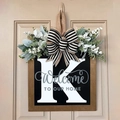 Personalized wooden front door sign with white letter K and striped bow decoration - Letter K