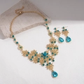 Parure di gioielli vintage dorata con ciondoli a goccia blu e design floreale in zircone - Set Collana e Orecchini Oro